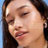 7165 3 peau fluide solaire glow kerbi webp